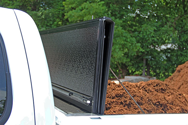 UnderCover Flex Hard Folding Tonneau Cover - Silverado/Sierra (Short Bed - with rail caps) ( 2007 - 2013 )