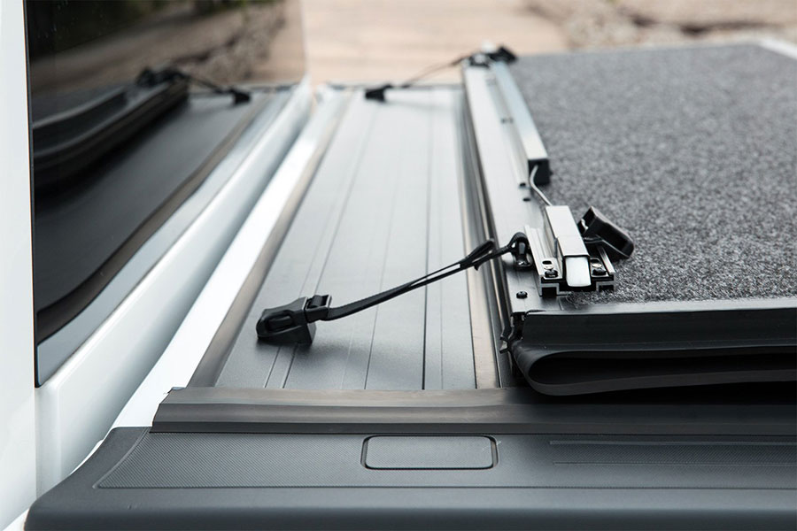 UnderCover Ultra Flex Hard Folding Tonneau Cover - Silverado/Sierra (Short Bed) ( 2014 - 2018 )